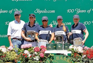 Estancia Ventarron team accepts their trophy from sponsor Jeff Kazmark before the florally bedecked trophy stand at the Santa Barbara Polo Club.