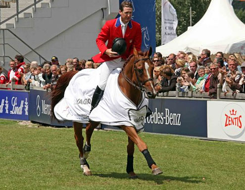 McLain Ward and Rothchild take the victory lap in Aachen, Germany.